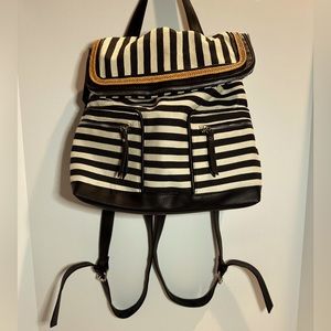 Striped backpack purse with brown woven leather trim & black faux leather straps